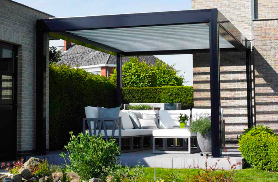 Black, Rollac Camargue Over A Backyard Patio With Furniture and Greenery