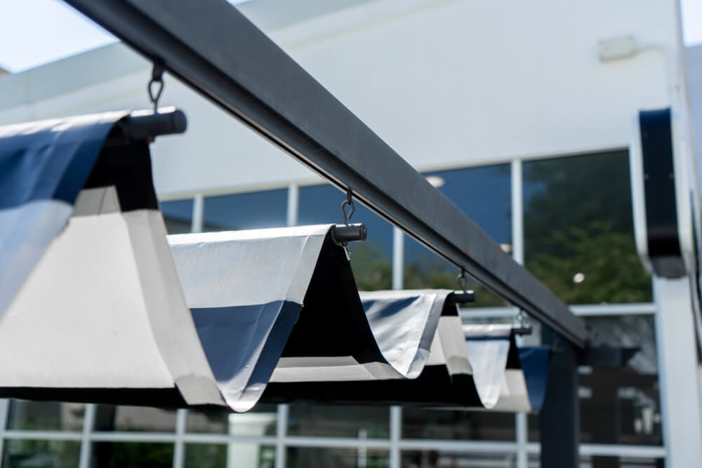 White and blue retractable awnings
