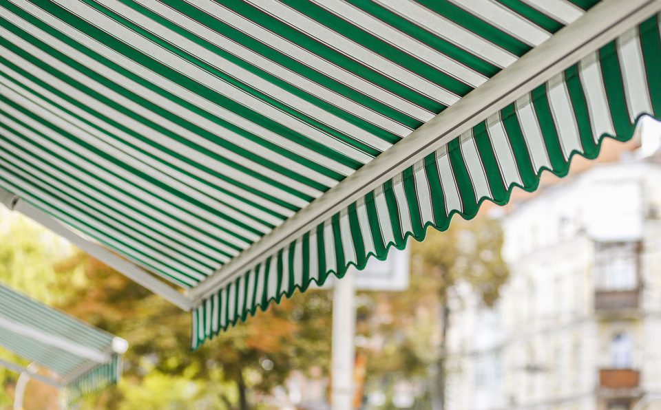 Green and white striped awning valance