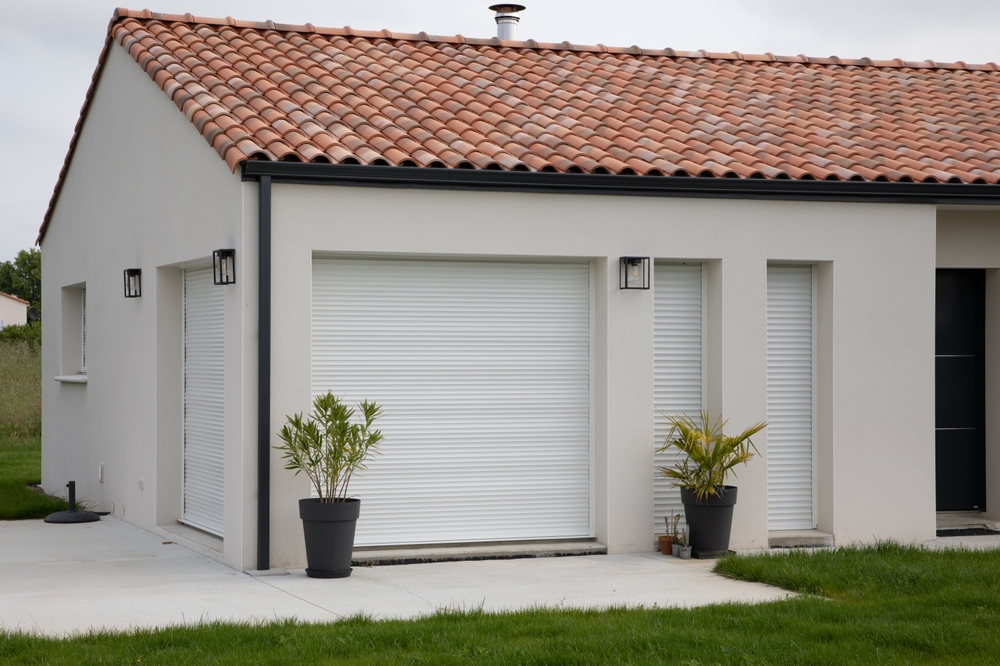 White House with Rolling Shutters Installed at Windows and Doors