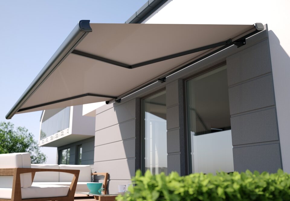 Large Retractable Awning Installed at the Patio of a House