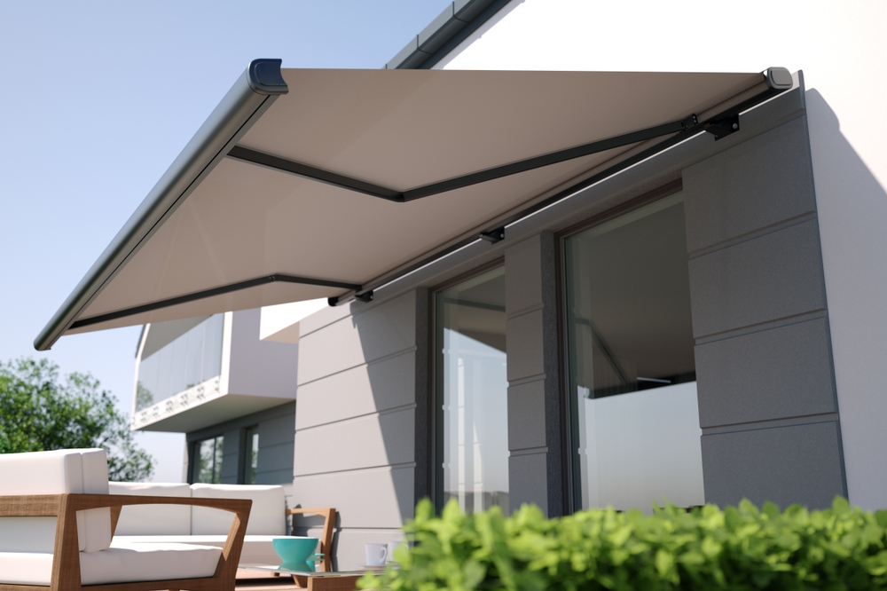 Large Retractable Awning Installed at the Patio of a House